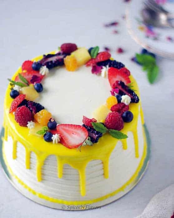 Decorate a cake with fruits