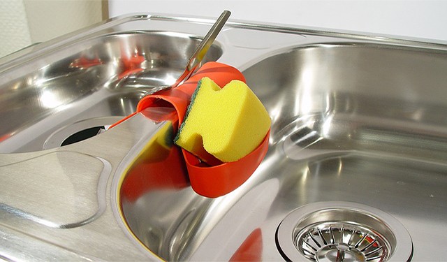 Use commercial rust removers on stainless steel sink