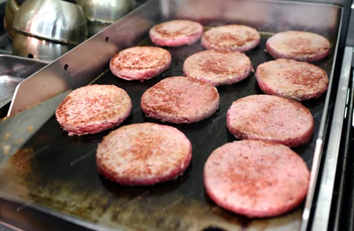 cook burgers on a griddle