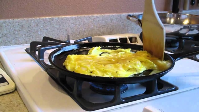 scrambled eggs on a griddle
