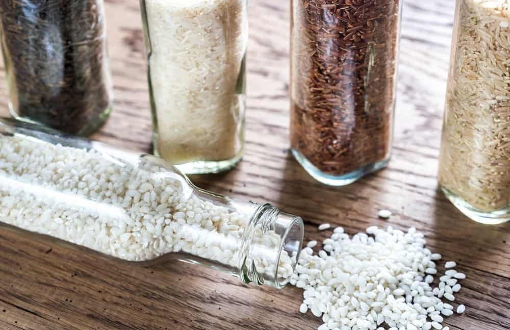 Calrose rice, Jasmine rice, and other kinds of rice in a bottle.