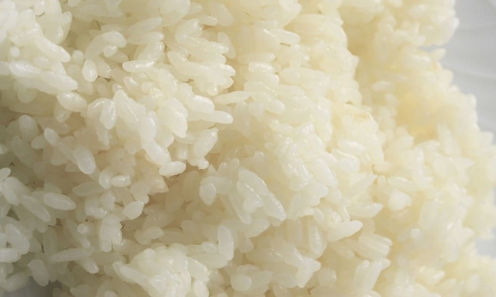 Fluffy cooked white rice.